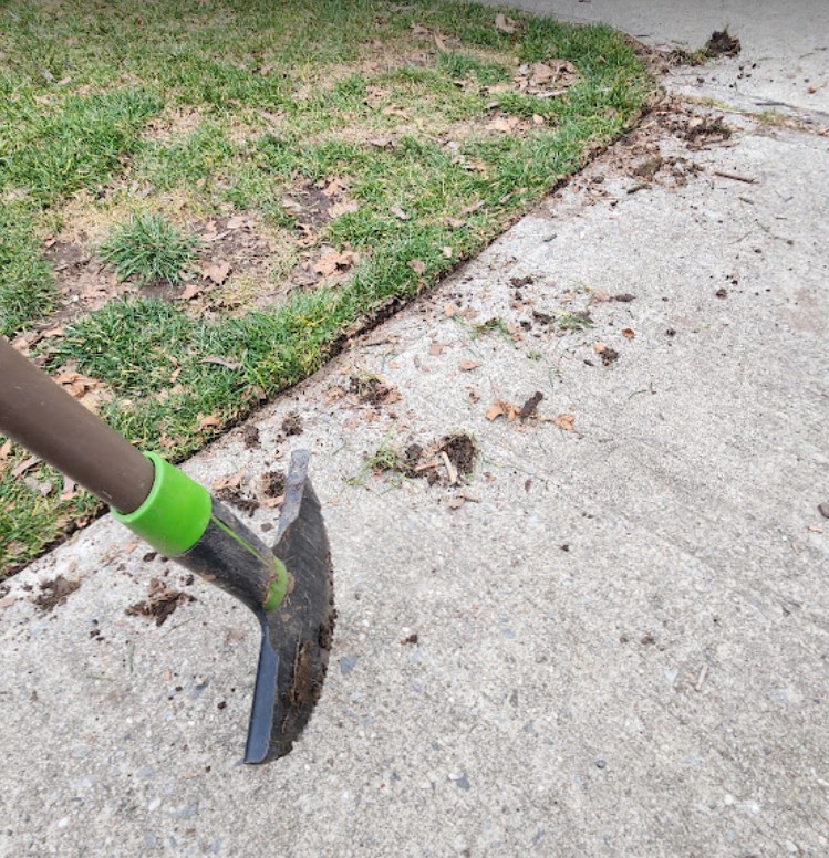 edging a lawn with a half moon edger edging a lawn with a half moon edger